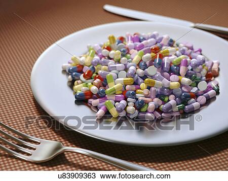 "Plate covered in pills, illustration" View Large Illustration Drawing - "Plate covered in pills, illustration". Fotosearch
