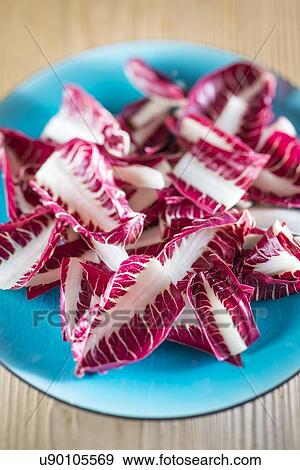 Radicchio treviso on a plate View Large Photo Image Stock Photo - Radicchio treviso on a plate. Fotosearch