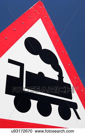 Stock Image - Railway crossing warning sign. Fotosearch