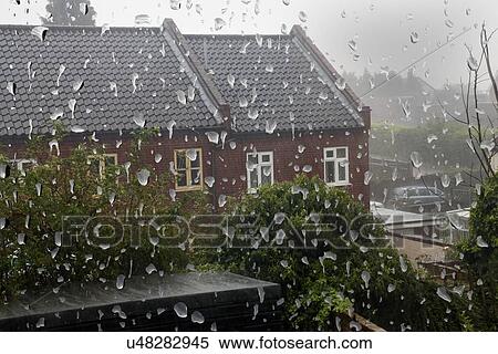 Rain drops on window View Large Photo Image Stock Photography - Rain drops on window. Fotosearch