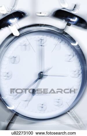 Stock Image - Ringing alarm clock. Fotosearch