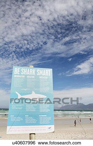 Stock Photograph - Shark attack warning sign. Fotosearch