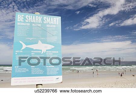 Stock Photograph - Shark attack warning sign. Fotosearch