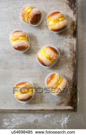 Baking tray of pesche di prato dessert View Large Photo Image Stock Photography - Baking tray of pesche di prato dessert. Fotosearch