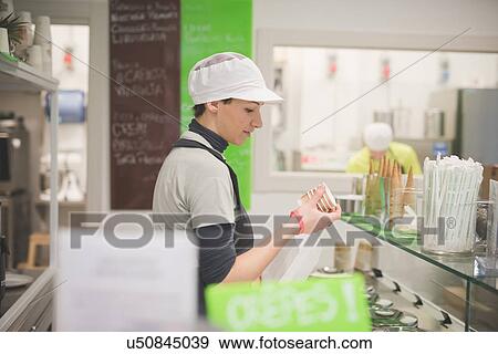 Barista working at cafe View Large Photo Image Stock Photo - Barista working at cafe. Fotosearch