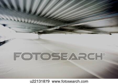 Stock Photo - Blurred shot under corrugated roof. Fotosearch