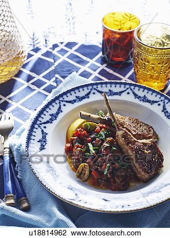 Stock Image - Bowl of Italian stewed vegetable and meat chop with balsamic vinegar. Fotosearch
