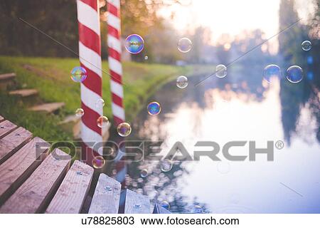 "Bubbles floating by river, Dolo, Venice, Italy" View Large Photo Image Stock Image - "Bubbles floating by river, Dolo, Venice, Italy". Fotosearch