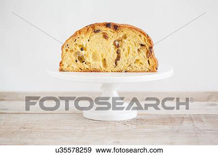 Cake stand with sliced panettone View Large Photo Image Stock Photo - Cake stand with sliced panettone. Fotosearch