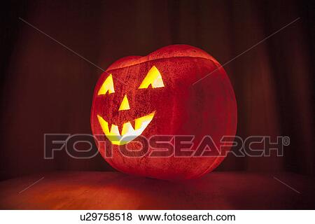 Stock Photo - Carved pumpkin. Fotosearch