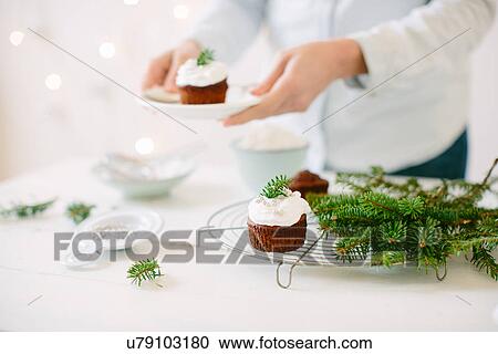 Chocolate cupcakes topped with whipped cream View Large Photo Image Stock Image - Chocolate cupcakes topped with whipped cream. Fotosearch