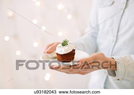 Chocolate cupcakes topped with whipped cream View Large Photo Image Stock Image - Chocolate cupcakes topped with whipped cream. Fotosearch