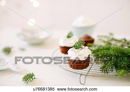 Chocolate cupcakes topped with whipped cream View Large Photo Image Stock Photography - Chocolate cupcakes topped with whipped cream. Fotosearch