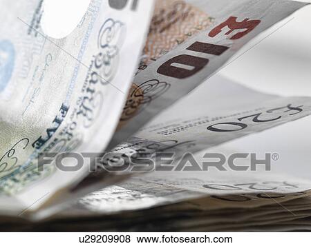 Close up detail of a stack of British banknotes View Large Photo Image Stock Photo - Close up detail of a stack of British banknotes. Fotosearch