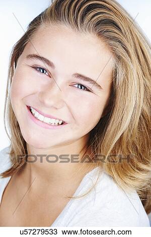 Stock Image - Close up portrait of pretty teenage girl. Fotosearch