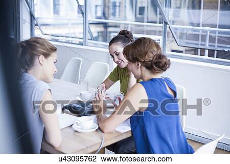 Colleagues on conference call View Large Photo Image Stock Image - Colleagues on conference call. Fotosearch
