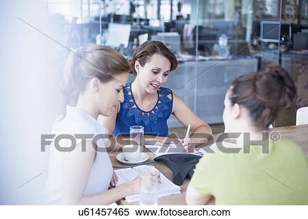 Stock Photography - Colleagues on conference call. Fotosearch