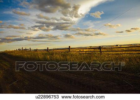 "Dirt track and field at sunset, Sarsy Village, Sverdlovsk Oblast, Russia" View Large Photo Image Stock Image - "Dirt track and field at sunset, Sarsy Village, Sverdlovsk Oblast, Russia". Fotosearch