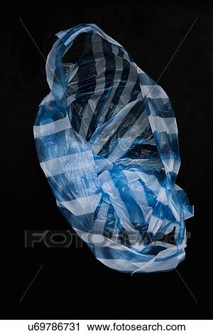 Empty blue and white plastic bag View Large Photo Image Stock Image - Empty blue and white plastic bag. Fotosearch