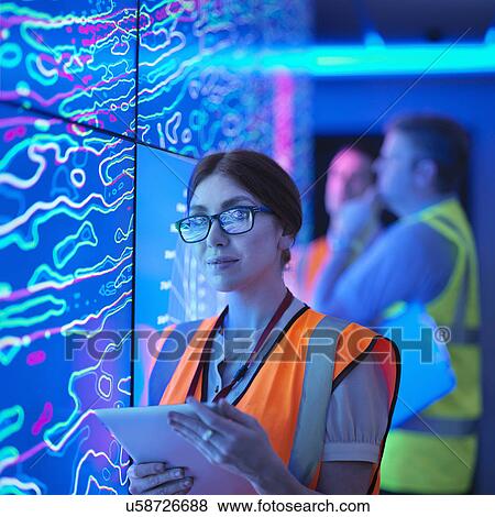 "Female geologist studying graphical display of oil and gas bearing rock on screens, portrait" View Large Photo Image Stock Photo - "Female geologist studying graphical display of oil and gas bearing rock on screens, portrait". Fotosearch