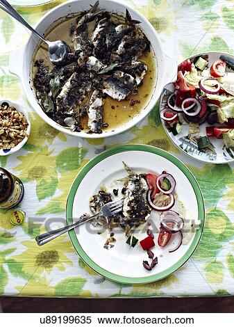 Stock Photography - Greek baked sardines. Fotosearch