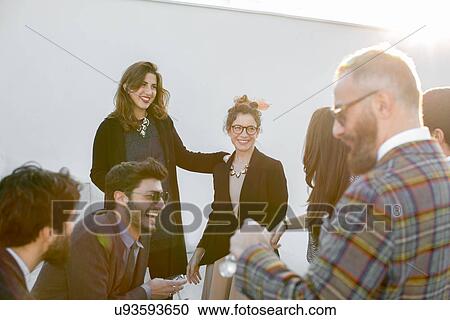 Group of friends having fun at party View Large Photo Image Stock Image - Group of friends having fun at party. Fotosearch