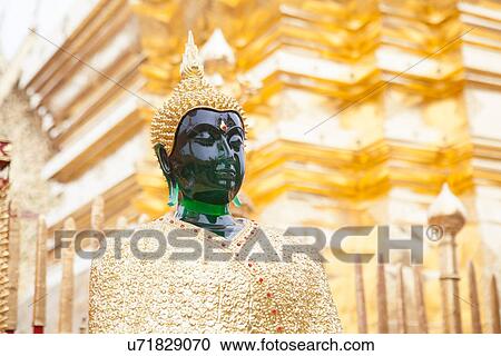 "Jade buddha in front of golden temple, Chiang Mai, Thailand" View Large Photo Image Stock Image - "Jade buddha in front of golden temple, Chiang Mai, Thailand". Fotosearch