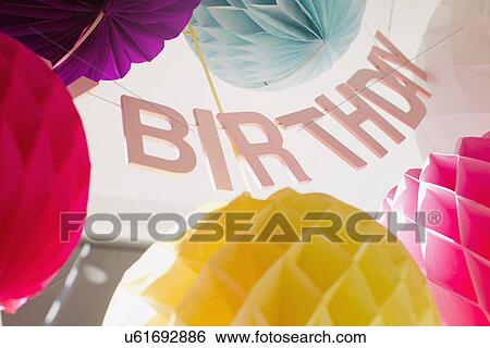Low angle view of colorful birthday decorations View Large Photo Image Stock Photograph - Low angle view of colorful birthday decorations. Fotosearch
