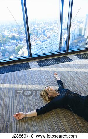 Mature woman practising yoga in room View Large Photo Image Stock Image - Mature woman practising yoga in room. Fotosearch