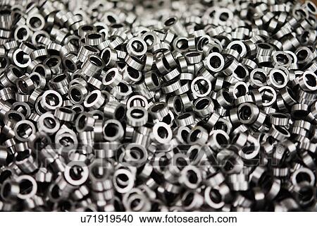 Stock Image - " Metal components used in crane manufacturing facility, China". Fotosearch