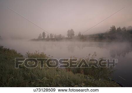"Mist over river at dawn, Sarsy Village, Sverdlovsk Oblast, Russia" View Large Photo Image Stock Photo - "Mist over river at dawn, Sarsy Village, Sverdlovsk Oblast, Russia". Fotosearch