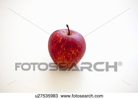 Stock Image - One red apple against white background. Fotosearch