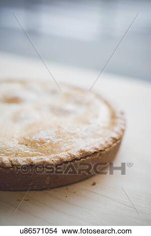 Pie on table View Large Photo Image Picture - Pie on table. Fotosearch