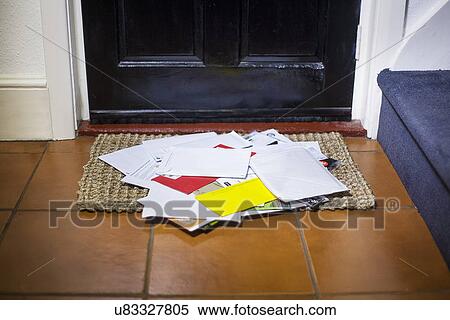 Pile of mail on doormat View Large Photo Image Stock Photography - Pile of mail on doormat. Fotosearch