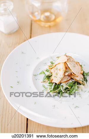 Plate of roasted guinea fowl on greens and forest tarragon View Large Photo Image Stock Image - Plate of roasted guinea fowl on greens and forest tarragon. Fotosearch
