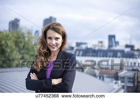 Stock Photo - "Portrait of businesswoman, outdoors". Fotosearch