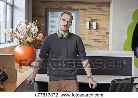 Portrait of male designer in office View Large Photo Image Stock Image - Portrait of male designer in office. Fotosearch