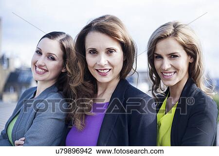 "Portrait of three businesswomen, outdoors" View Large Photo Image Stock Image - "Portrait of three businesswomen, outdoors". Fotosearch