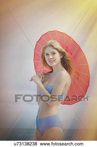 "Portrait of young blond woman wearing bikini on Miami Beach, Florida, USA" View Large Photo Image Stock Photo - "Portrait of young blond woman wearing bikini on Miami Beach, Florida, USA". Fotosearch
