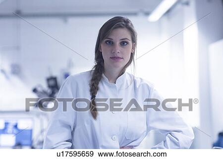 Portrait of young female scientist in lab View Large Photo Image Stock Photo - Portrait of young female scientist in lab. Fotosearch