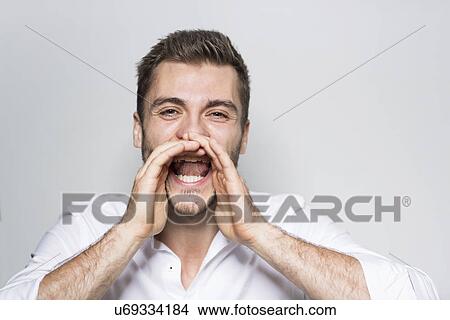 Portrait of young man shouting View Large Photo Image Picture - Portrait of young man shouting. Fotosearch