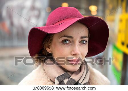 Portrait of young woman with hat and scarf View Large Photo Image Stock Photo - Portrait of young woman with hat and scarf. Fotosearch