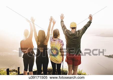 "Rear view of four young adult friends looking out over Lake Atitlan, Guatemala" View Large Photo Image Stock Photography - "Rear view of four young adult friends looking out over Lake Atitlan, Guatemala". Fotosearch