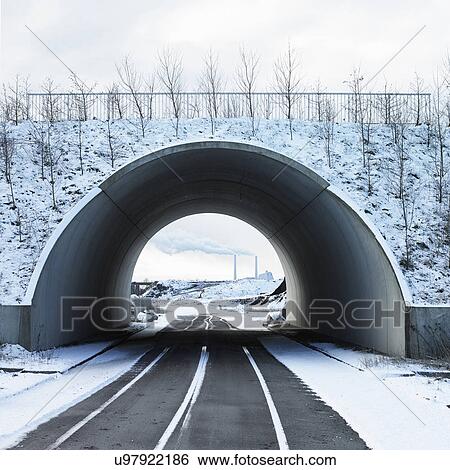 Road going through tunnel View Large Photo Image Stock Photograph - Road going through tunnel. Fotosearch