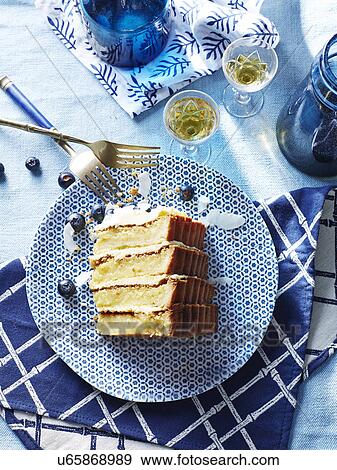 Slice of four stack cheesecake with blueberries and apple cider vinegar View Large Photo Image Stock Photo - Slice of four stack cheesecake with blueberries and apple cider vinegar. Fotosearch