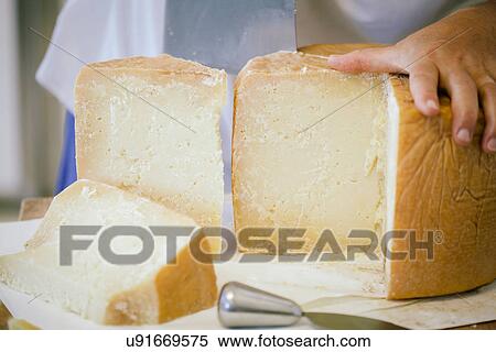 "Slicing pecorino, Tuscany, Italy" View Large Photo Image Stock Photography - "Slicing pecorino, Tuscany, Italy". Fotosearch
