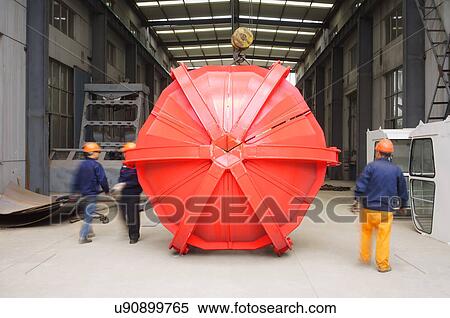 "Small group of workers in crane manufacturing facility, China" View Large Photo Image Stock Photography - "Small group of workers in crane manufacturing facility, China". Fotosearch