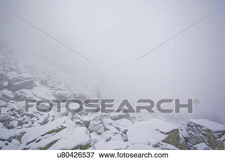 Stock Photo - "Snow covered rocks in mist, Sarsy Village, Sverdlovsk Oblast, Russia". Fotosearch