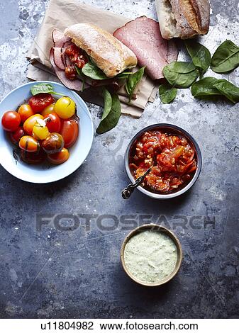 Still life of ham and bread with tomato chilli jam View Large Photo Image Stock Image - Still life of ham and bread with tomato chilli jam. Fotosearch
