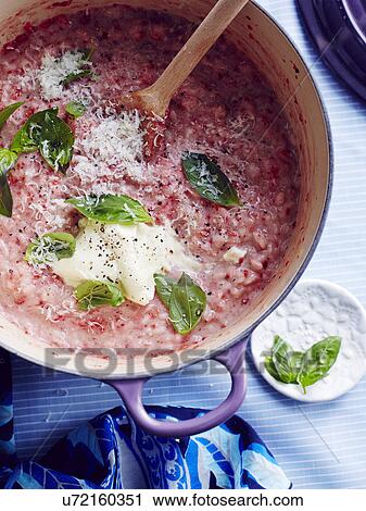 Stock Image - Still life of Italian strawberry risotto (risotto alle fragole). Fotosearch